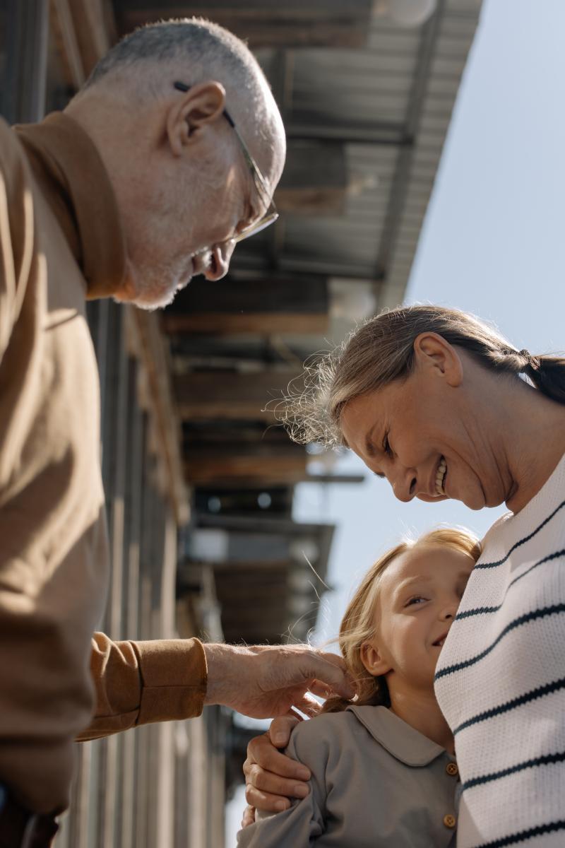 Two grandparents looking at their granddaughter Two grandparents looking at their granddaughter
